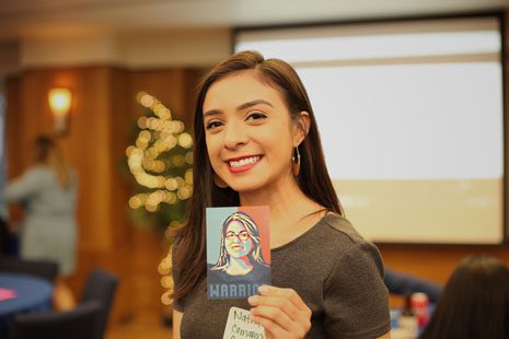 La Raza co-president Nathalie Camarena '19 with a Jeanette M. Acosta 