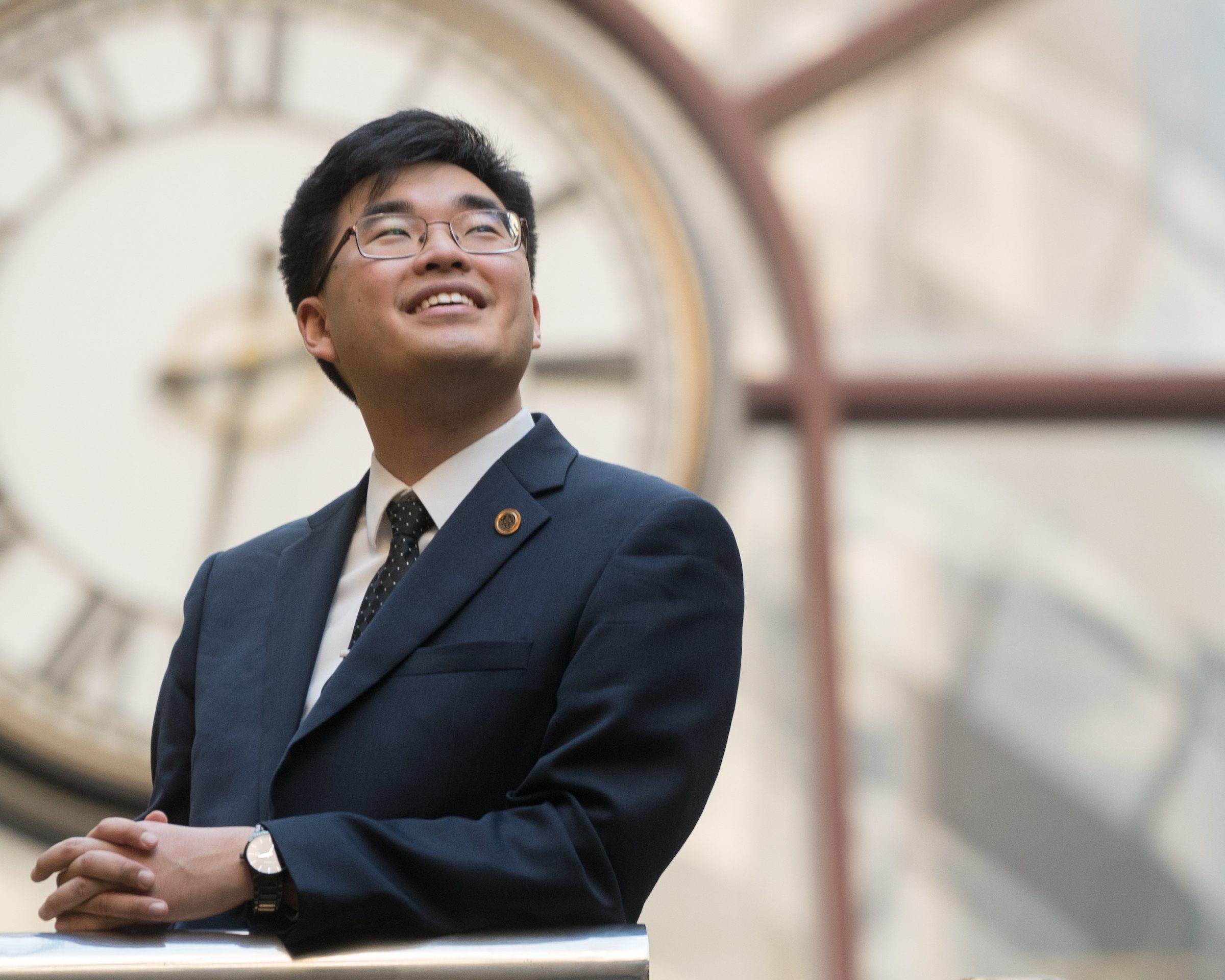 UC Law SF student looking up and smiling