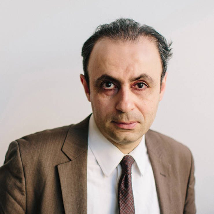 Headshot of Reza Dibadj