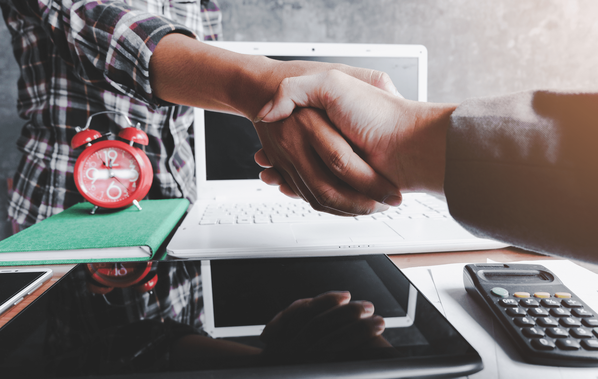 two people shaking hands