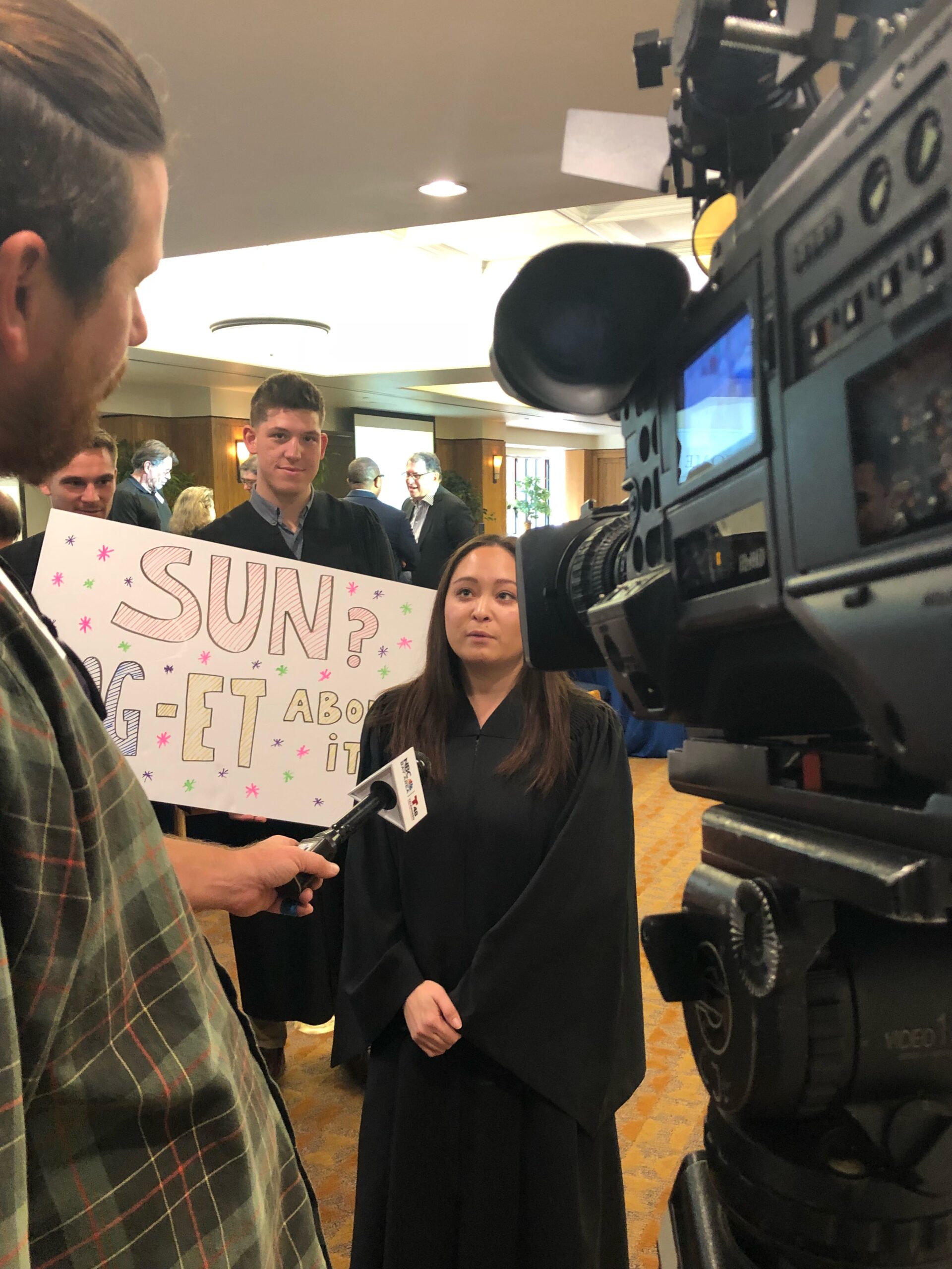 Camera crews interview Moot Court participants