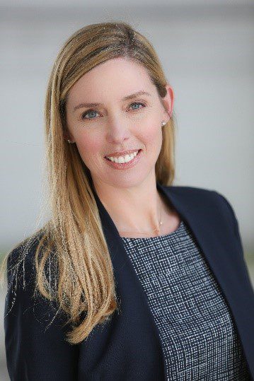 Headshot of Adrienne Leight Rogers