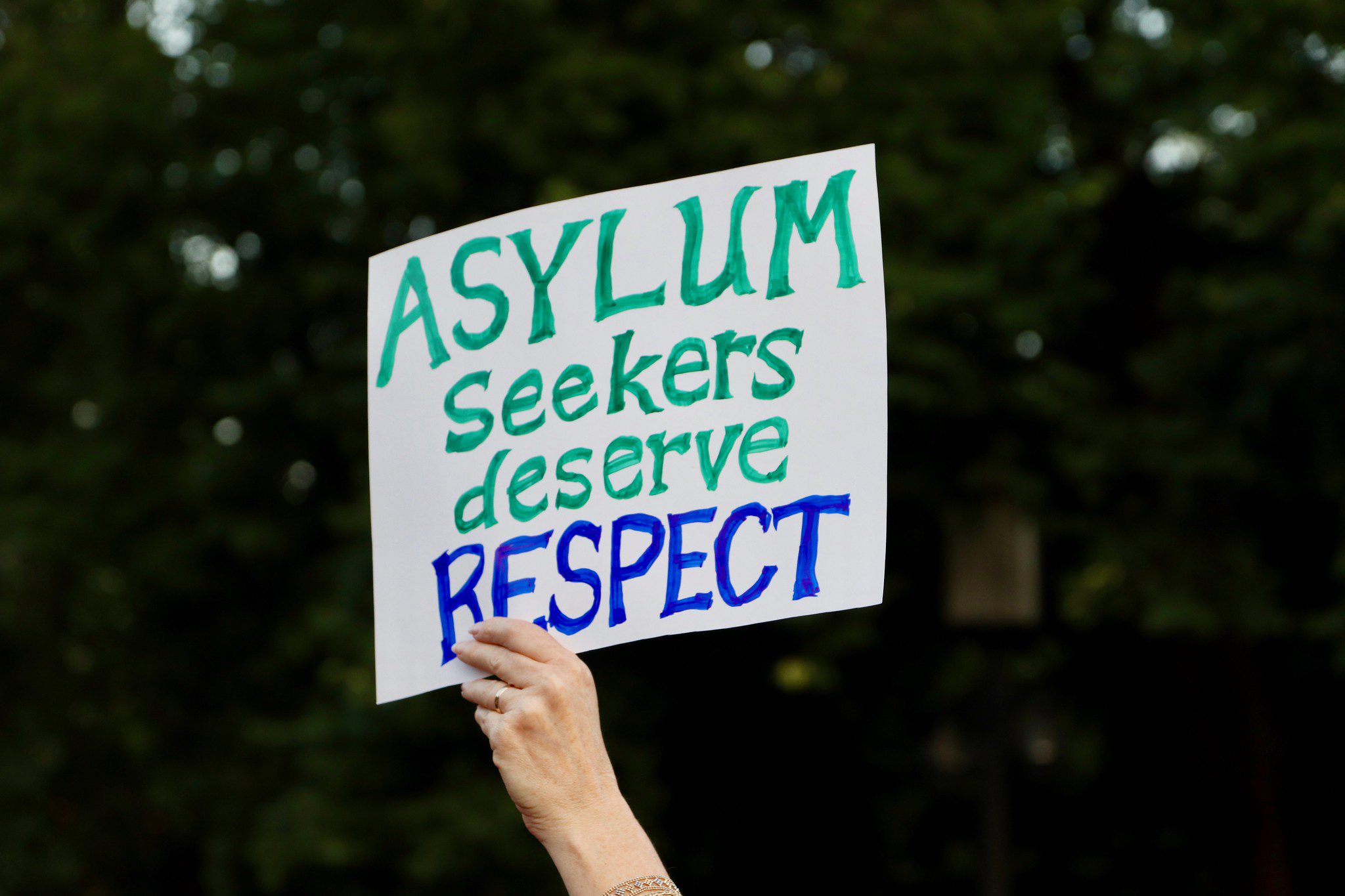 photo of protest sign that reads, 