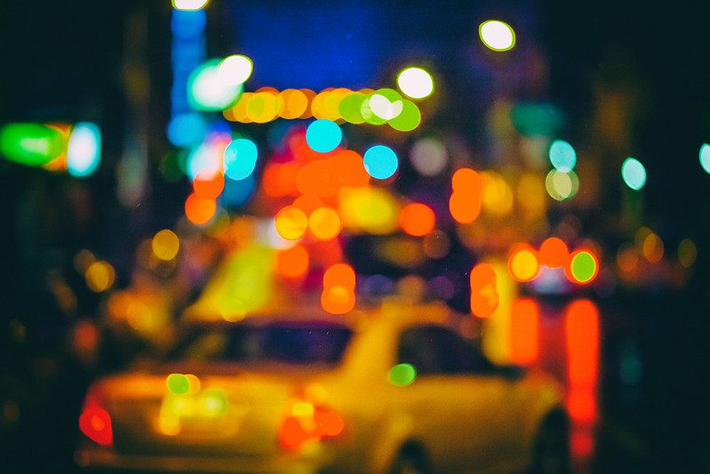 Colorful blurred photo of lights at night in city.
