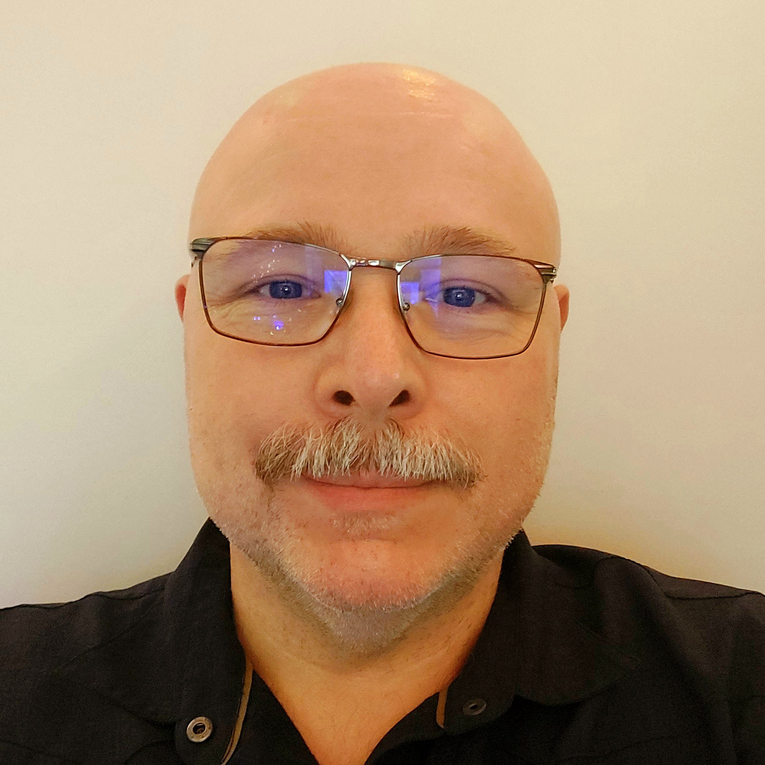 Headshot of Hayden Reynolds-Cowan