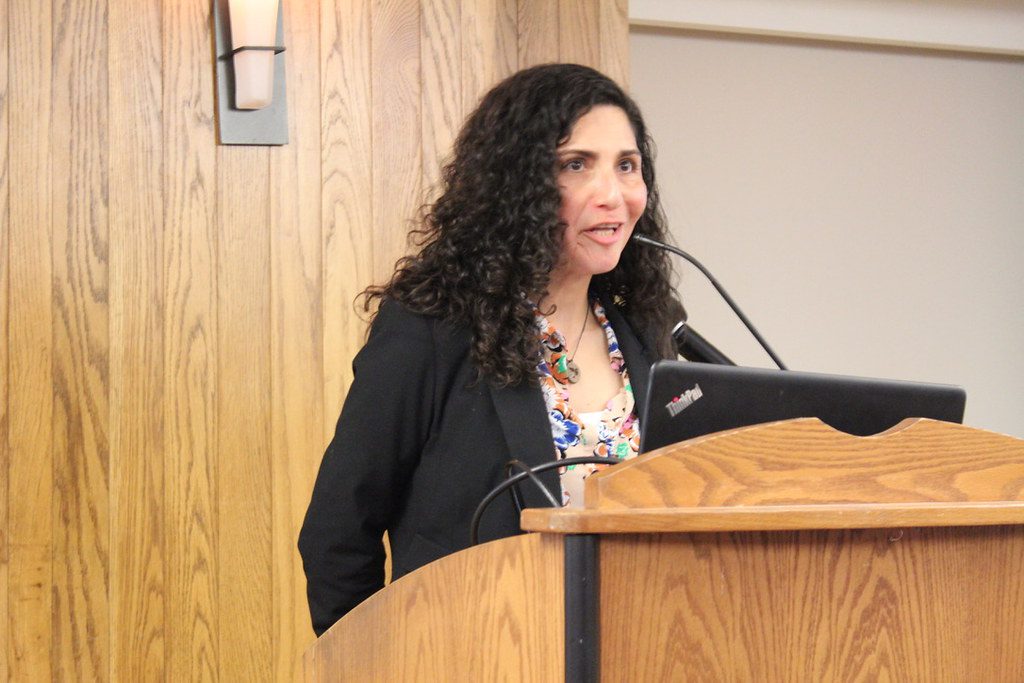 Rosamaria Cavalho '22 addresses students during a Public Interest Celebration