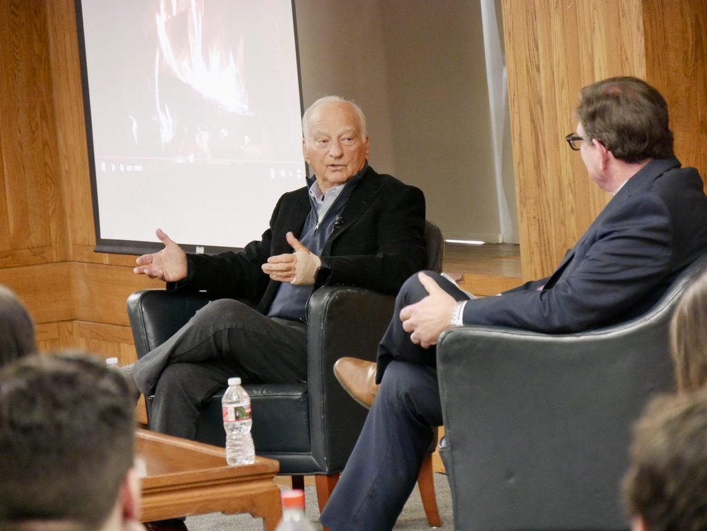 George Roberts '69 and Chancellor David Faigman sit in chairs during a fireside chat at UC Law SF, discussing the value of legal education.