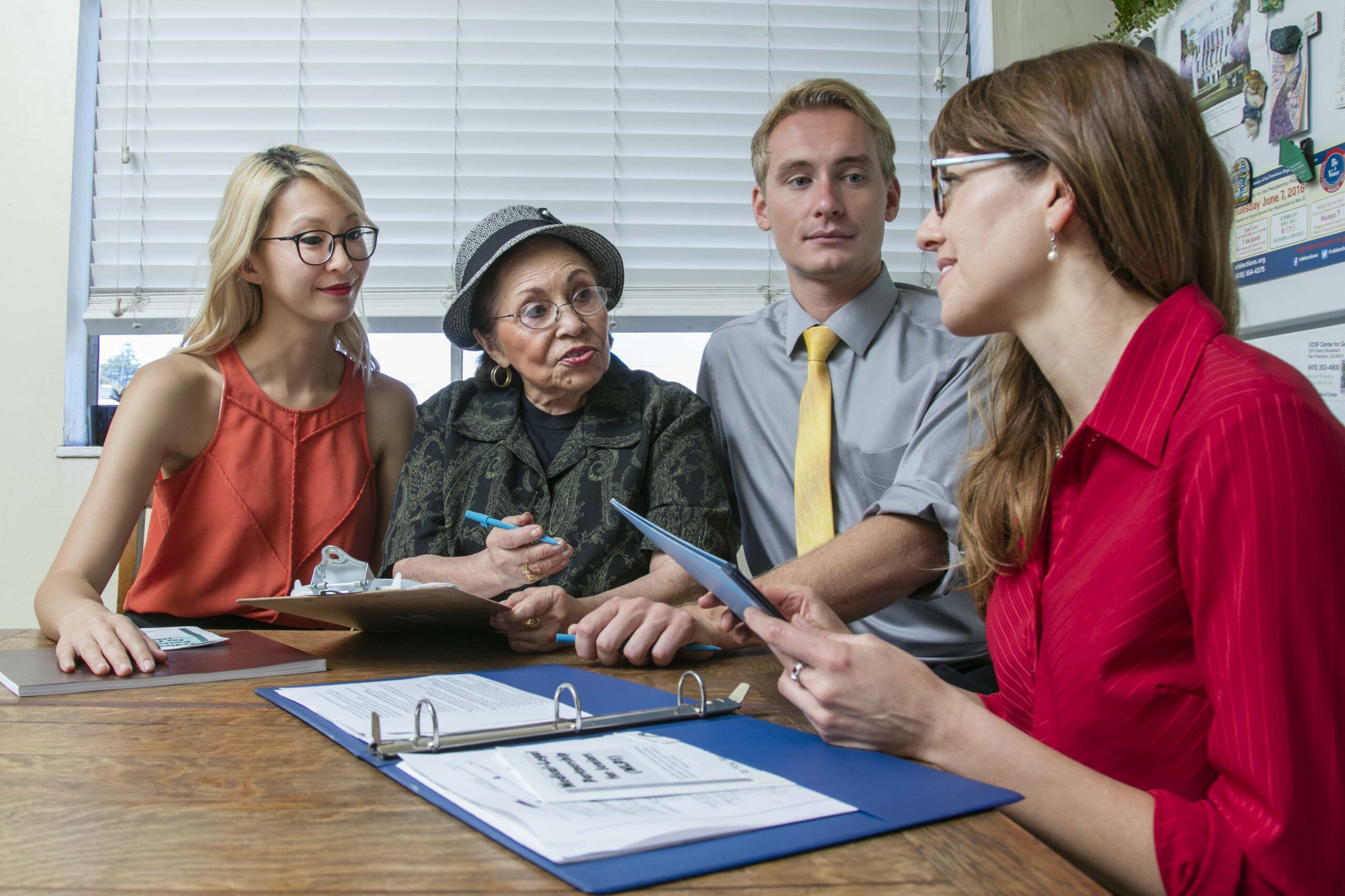 Supervised student attorneys meeting with a client.