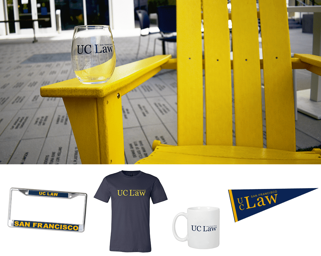 A collection of swag for UC Law SF including shirts, wine glasses and mugs