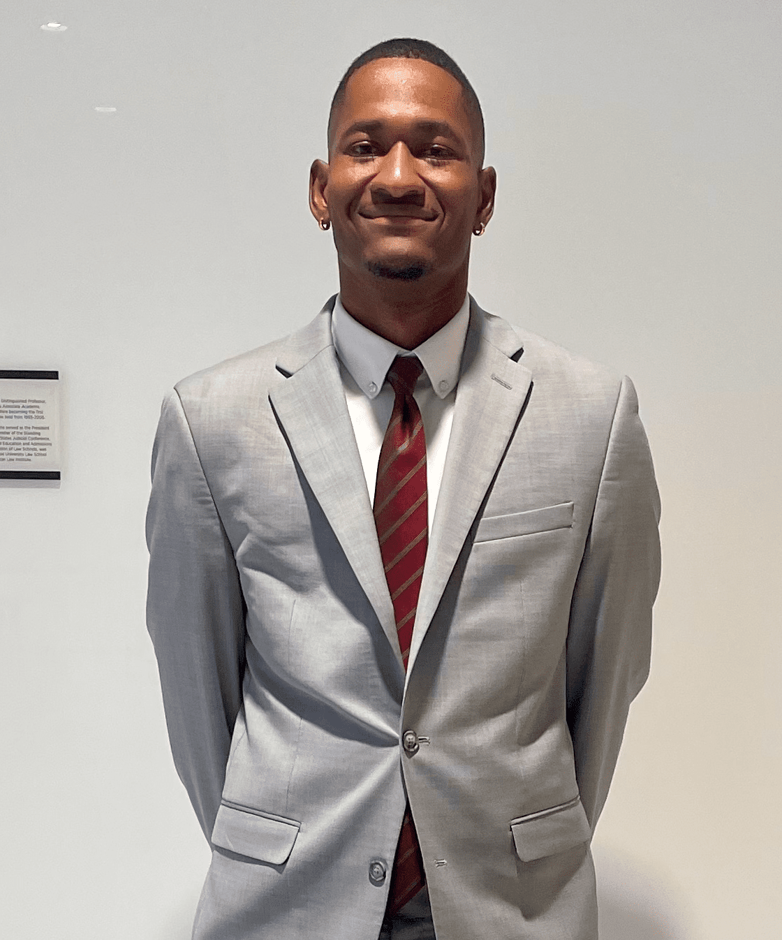 Headshot of law student Joshua Johnson wearing suit and tie