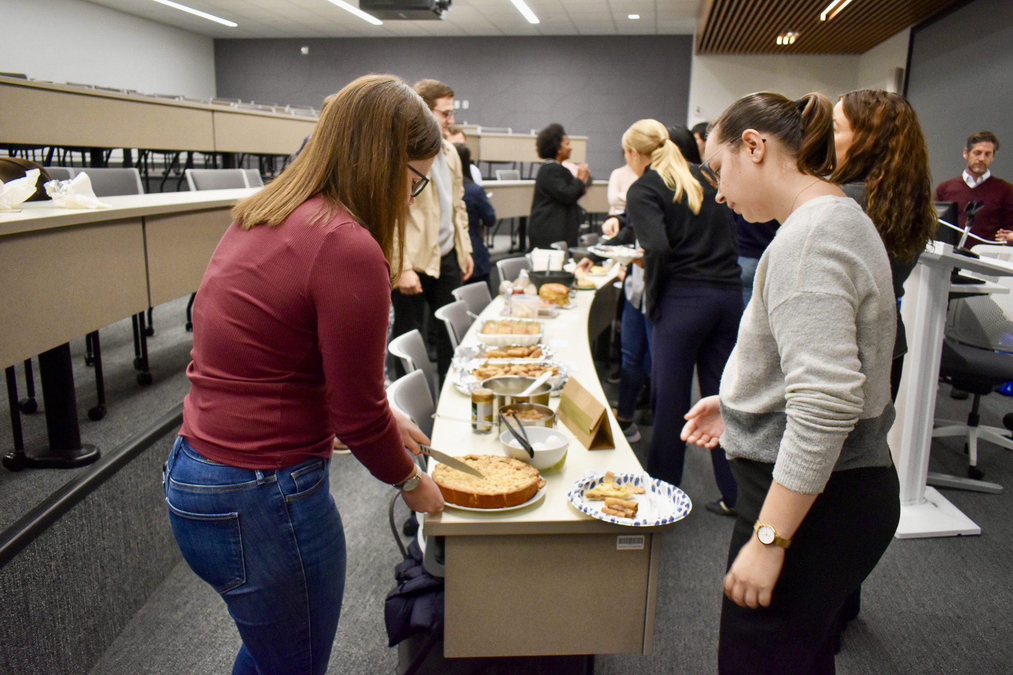 Students sharing food.
