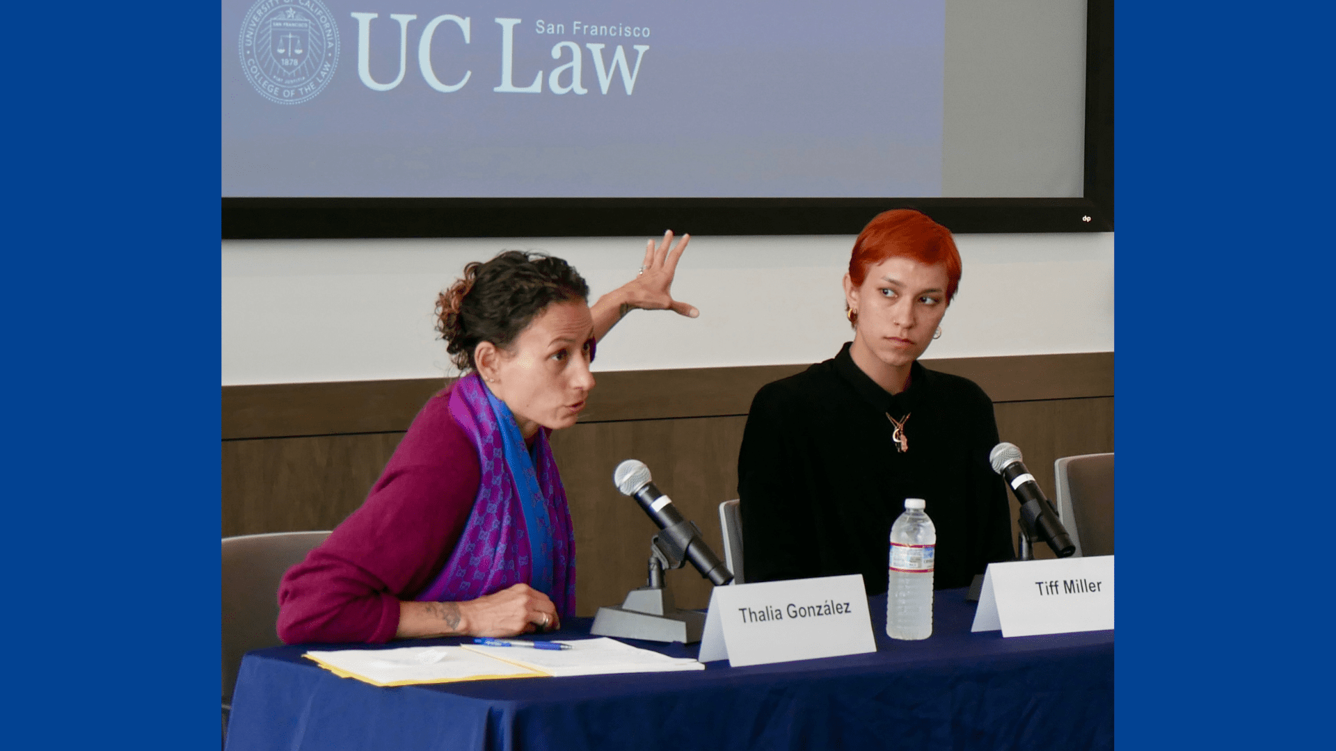 Professor Thalia González speaking into a microphone