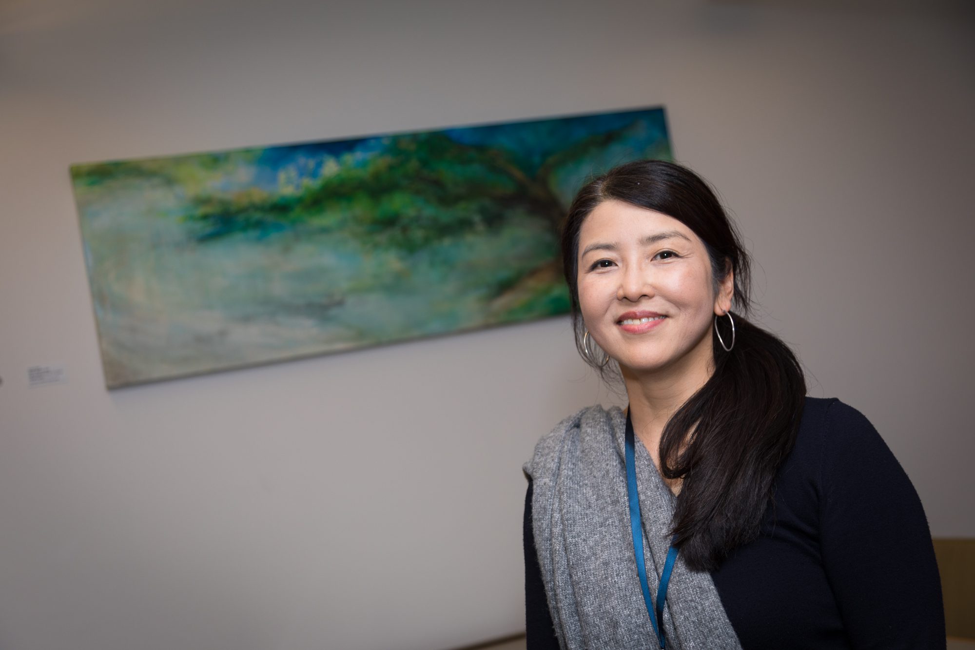 Artist Yukali Seci and her piece, “Kyotto Sonette,” on the sixth floor of Mary Kay Kane Hall.