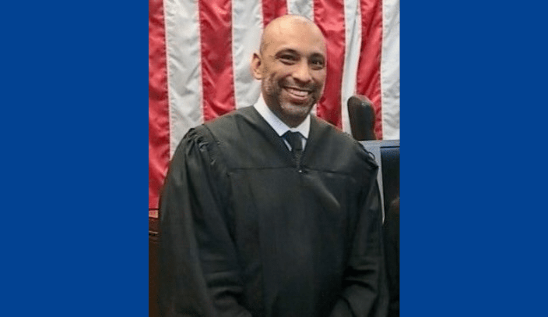 David Pereda wearing black judge robes