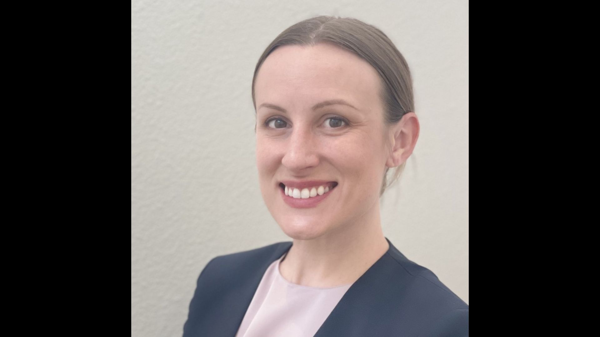 A head and shoulders portrait of Catherine Nasi.