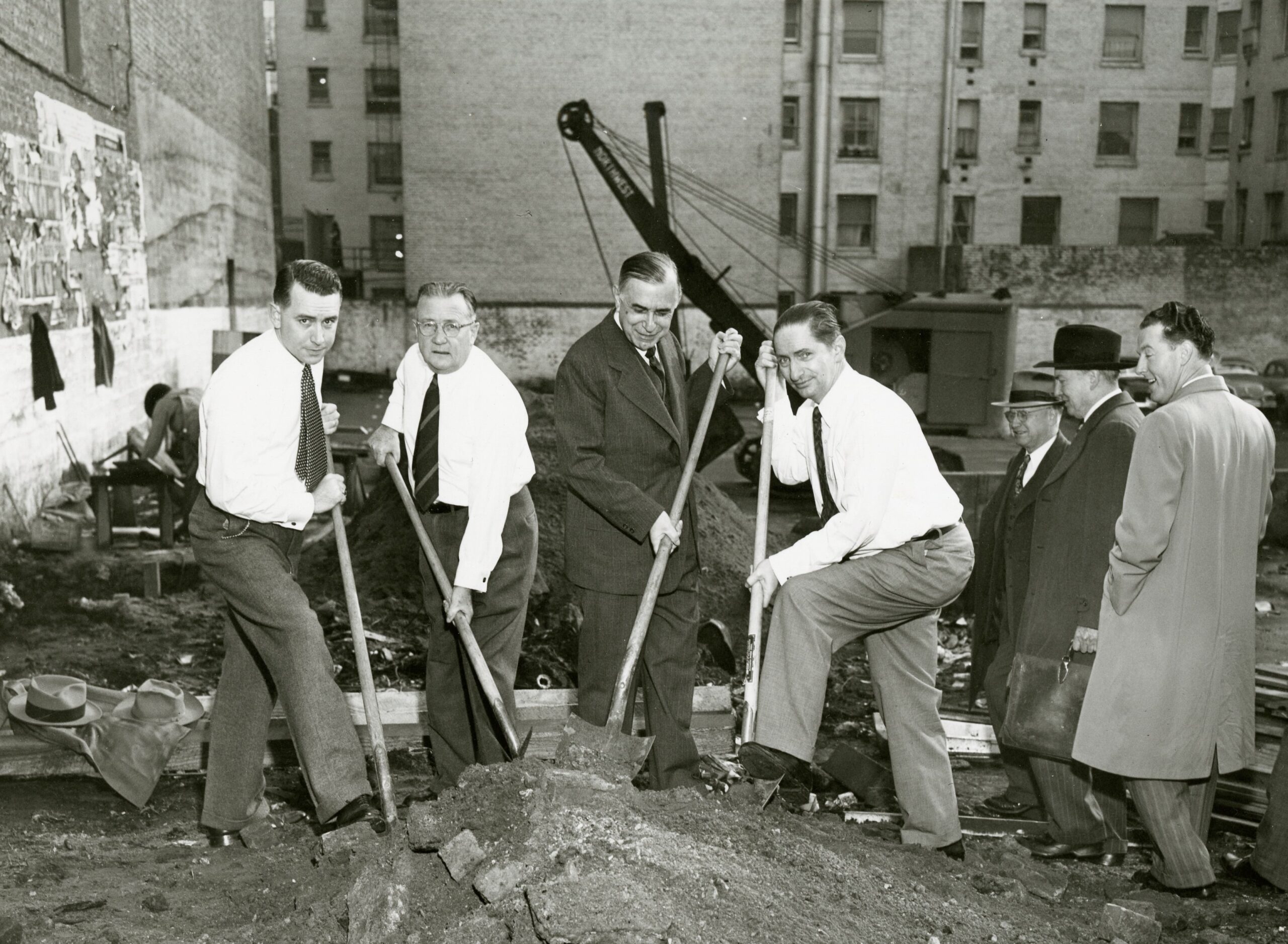 A photograph of a 1950 groundbreaking ceremony for the old 198 McAllister St. building shows four men holding shovels, including the unnamed president of UC Hastings student government body, California First District Court of Appeals Justice and 1910 UC Hastings graduate A. Frank Bray, California Supreme Court Chief Justice Phil S. Gibson, and then UC Hastings Dean David Snodgrass.