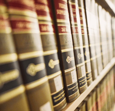 A law journal with a green and red cover on the shelf at the UC Law SF library.