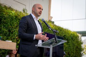 San Francisco Supervisor Bilal Mahmood speaks while standing at a lectern.