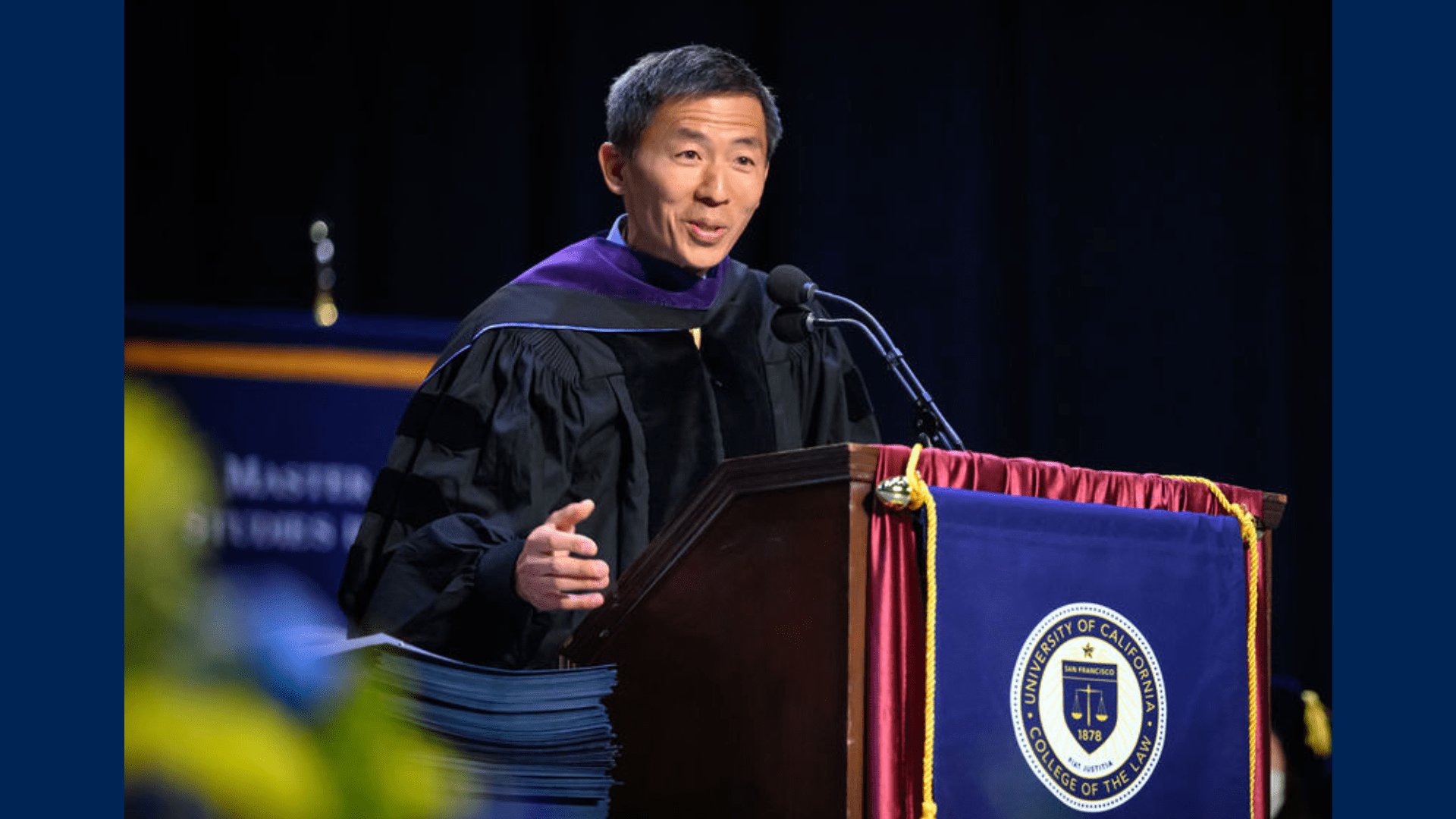 Goodwin Liu speaks behind a lecturn
