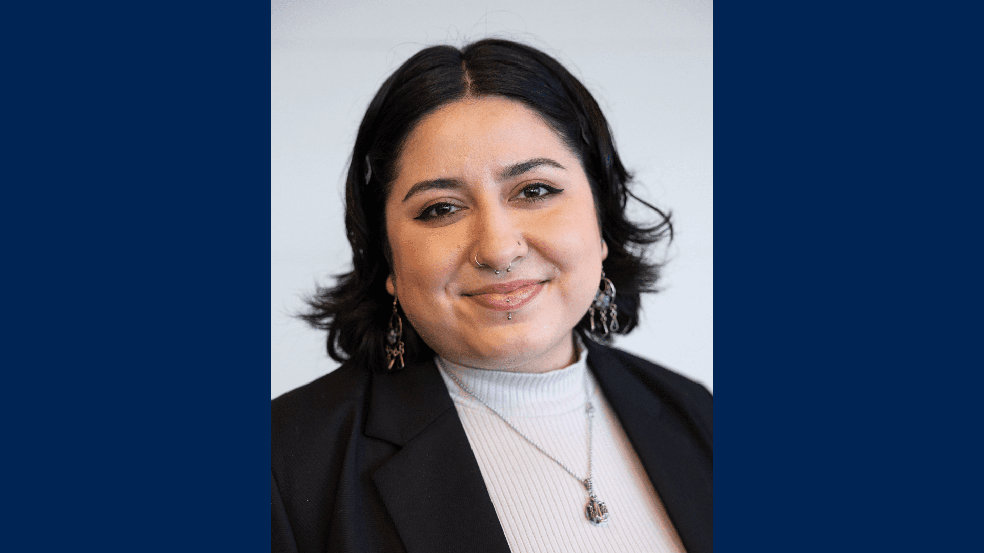 Headshot of Nimsi Garcia Sandoval wearing professional business attire