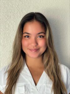 A portrait of Shanaya-Henderson.