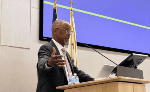 Chief U.S. District Judge Troy Nunley speaks at a podium.