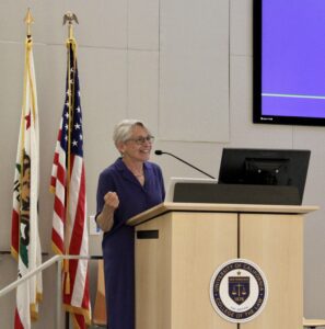 Sharon Grodin speaks behind a podium
