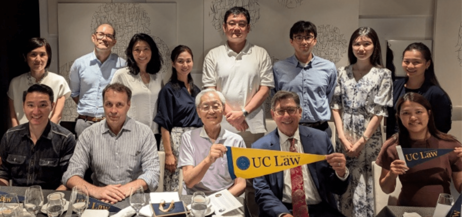 A group photo of Japan-based alumni with Professor Setsuo Miyazawa, Dean of Enrollment June Sakamoto, and Chancellor & Dean David Faigman