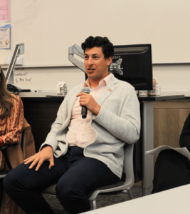 Nicholas Green with a microphone