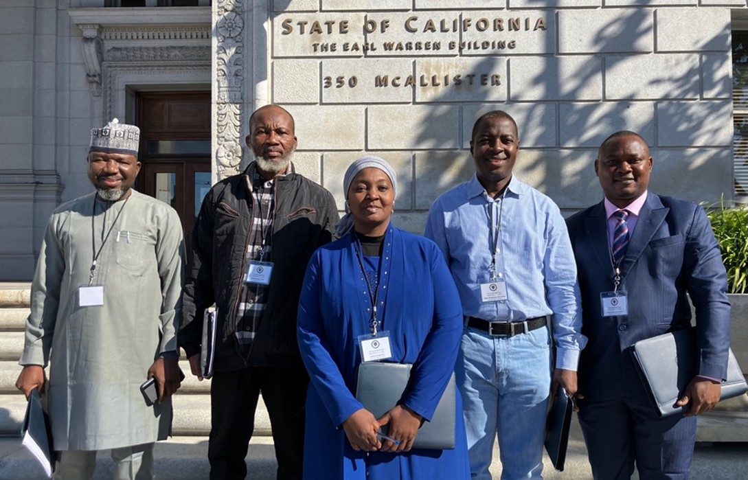 Five members of a Nigerian delegation outside the California Supreme Court
