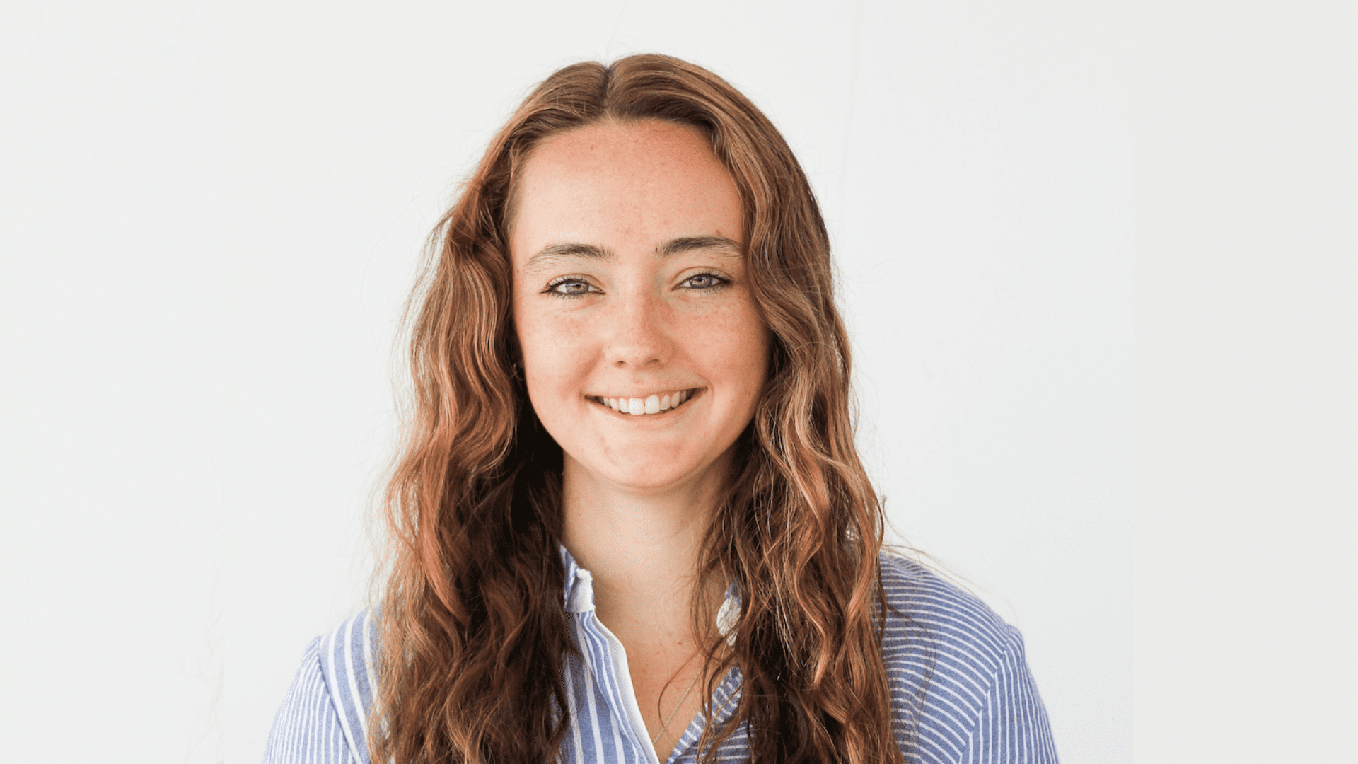 Headshot of law student Ellie Bowen wearing a striped shirt