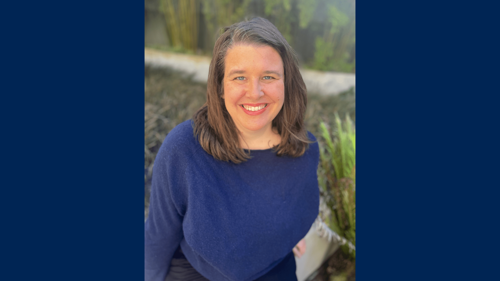 3L Rachel Sadler wearing a blue shirt outside.