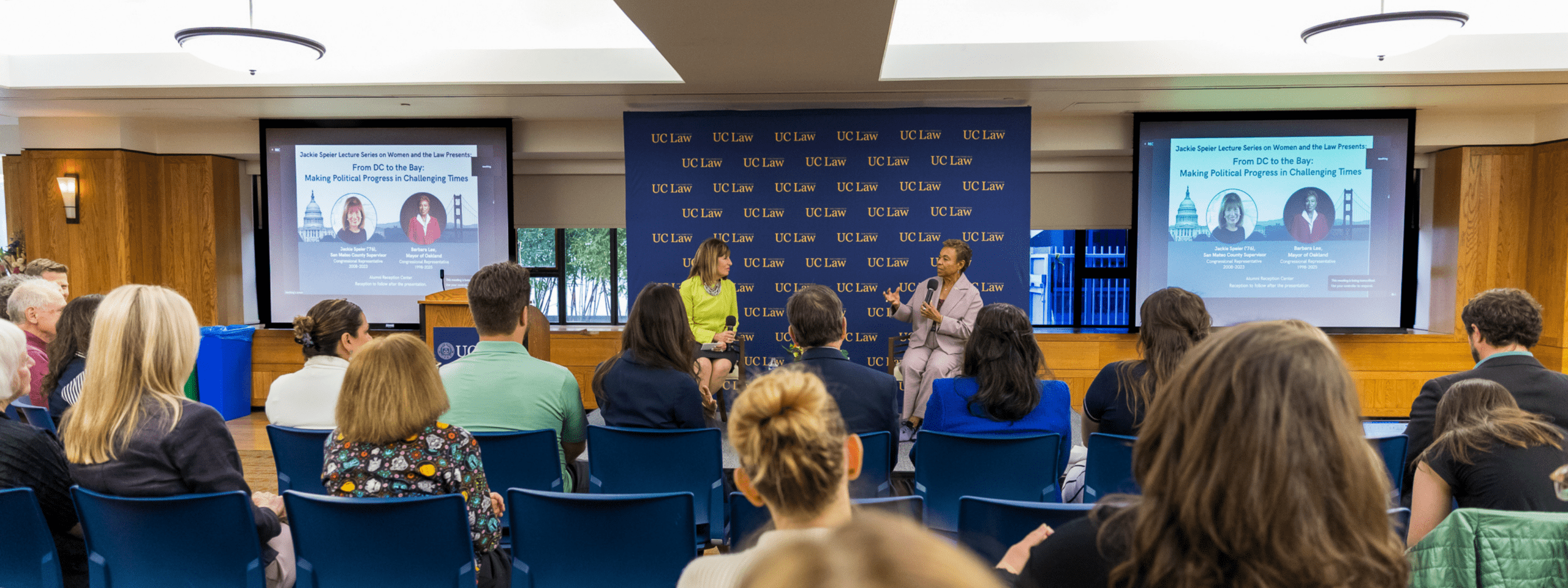 Jackie Speier and Barbara Lee speak in front of a crowd