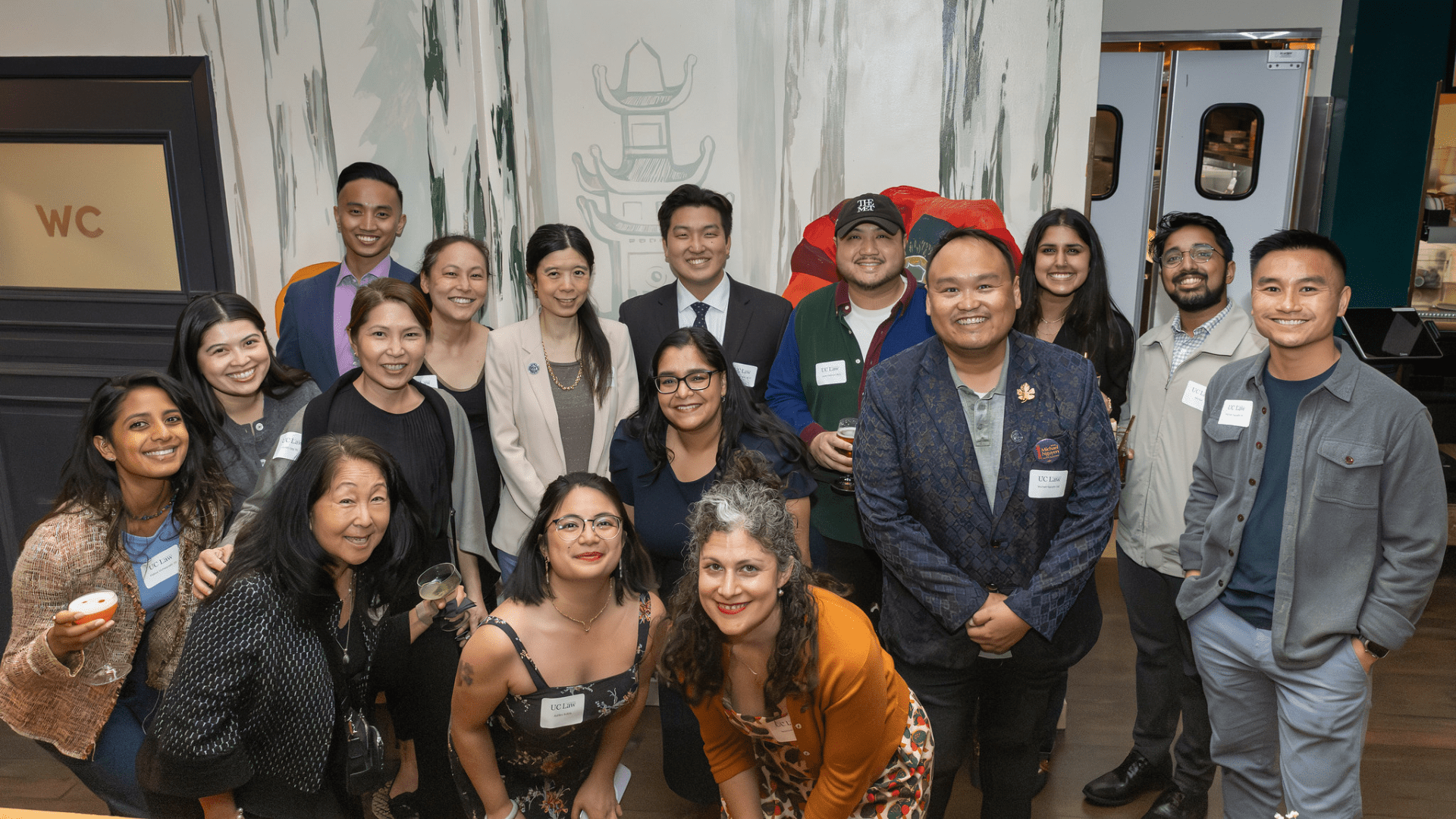 This photo shows UC Law SF graduates and staff celebrating the launch of the new AAPI Alumni Affinity Group.