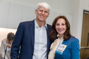 Class of '76 alumni Scott Morris and Carol Hamilton pose during a luncheon event.
