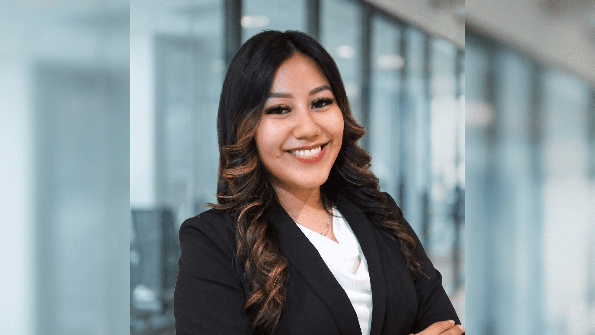This is a headshot of 2L Marilyn Aguilar-Portillo wearing a white shirt and black blazer.