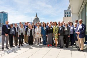 Members of UC Law SF's Half Century Club standing on the Sky Deck for a group photo