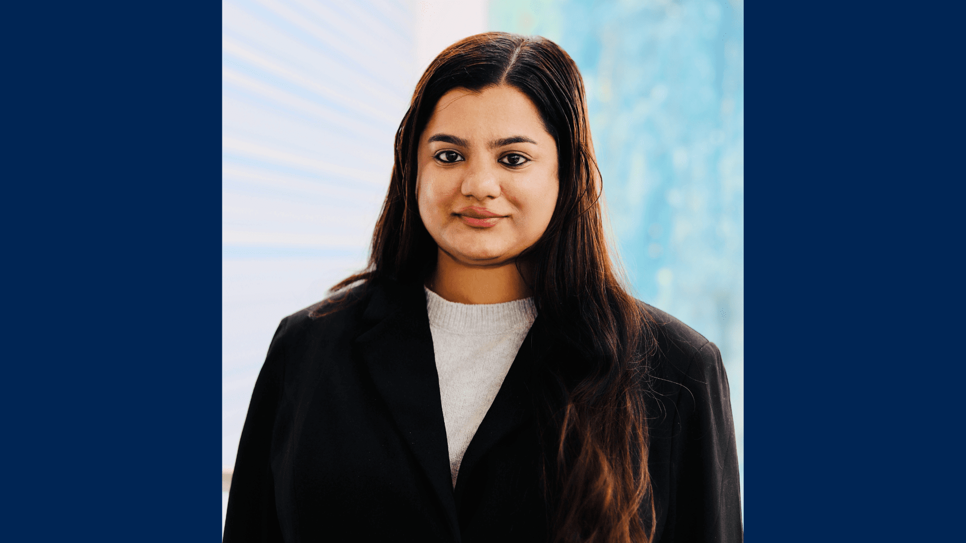 This is a headshot of Susmita Nanda LLM '26, wearing a black blazer and a white shirt.