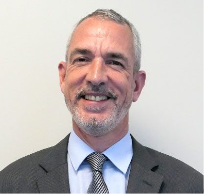 Headshot of David de Giles