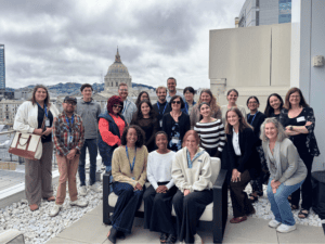 The incoming HPL class posing for a group photo on the UC Law SF Sky Deck