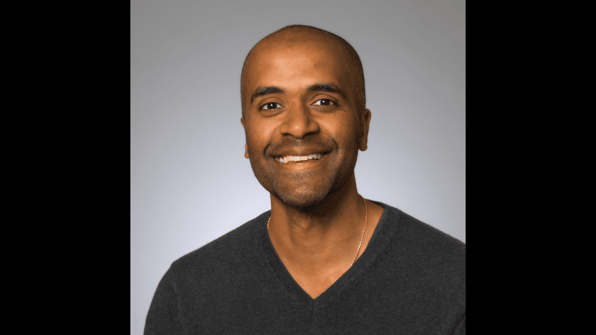 A headshot photo of Professor Manoj Viswanathan