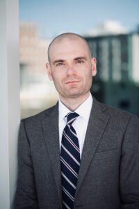 A headshot of UC Law SF student Max Giella. 