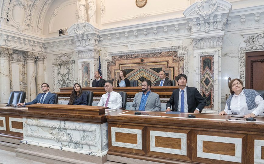 People sitting in a courtroom