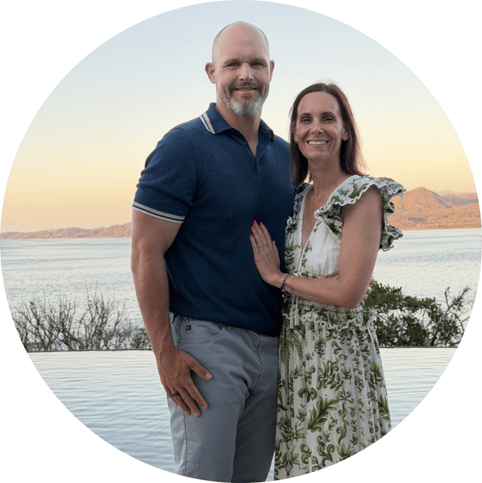 Kristin Sverchek ’07 with her partner beside the water
