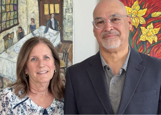 Two scholarship donors standing together