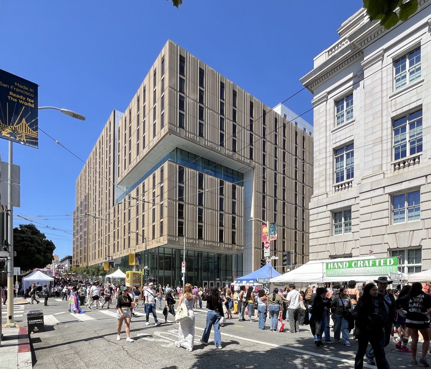 The Academic Village building on a busy San Francisco street